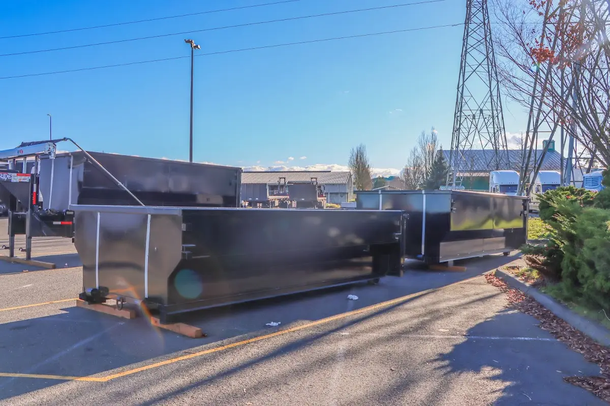 Roll-off dumpster ready for waste disposal at job site for 12 Yard Dumpster Rental in Ames